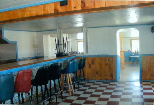 kitchen with dark tile floors