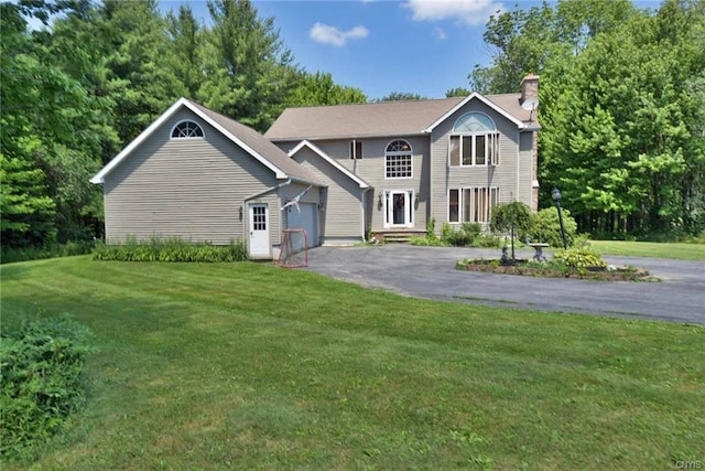 view of property with a front lawn