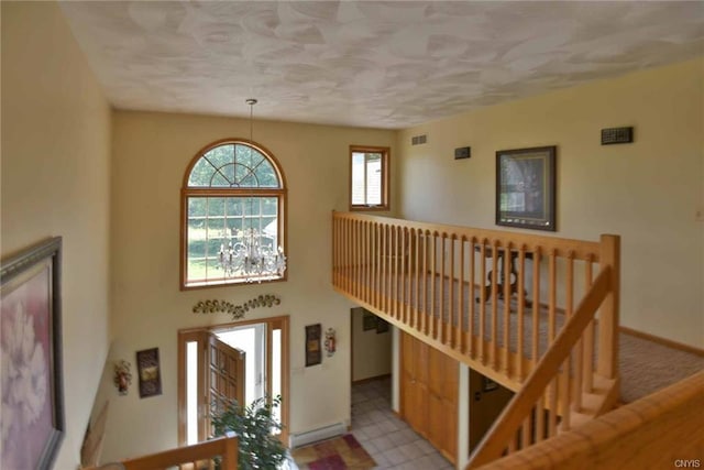 foyer entrance with light tile floors