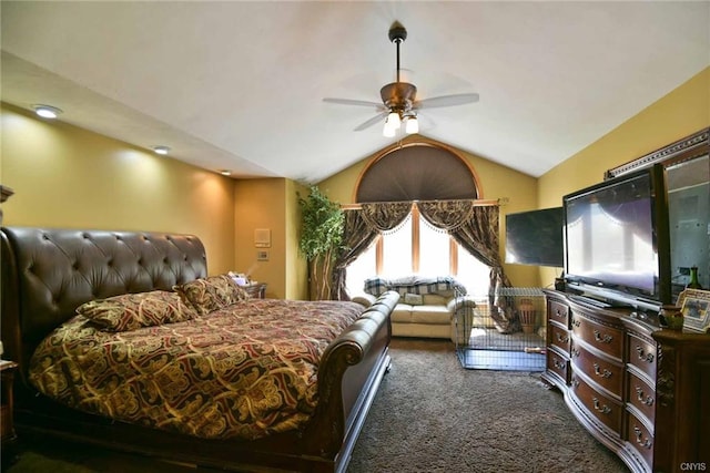 bedroom featuring ceiling fan, dark carpet, and lofted ceiling