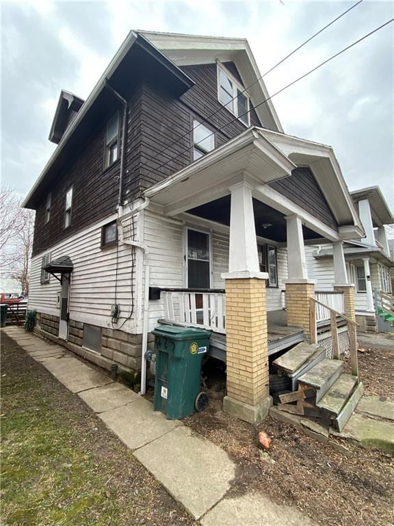 view of home's exterior featuring a porch