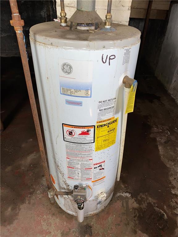 utility room with gas water heater