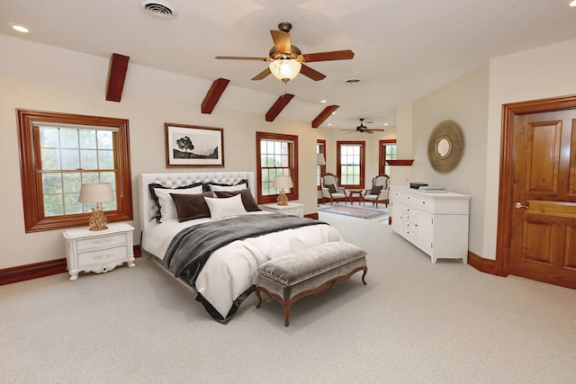 carpeted bedroom with ceiling fan