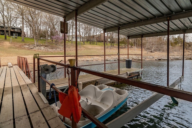 view of dock with a water view