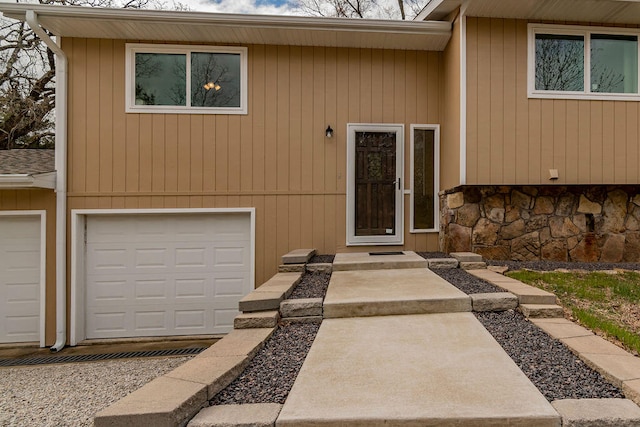 entrance to property featuring a garage