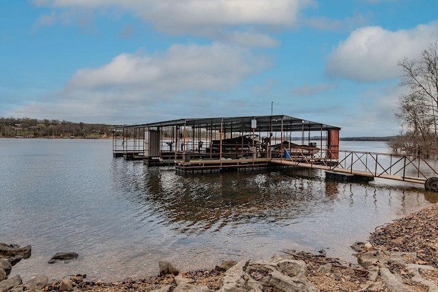 dock area featuring a water view