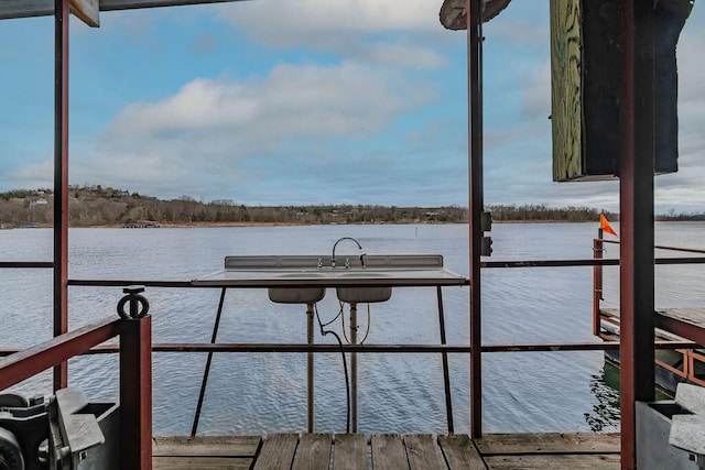 dock area featuring a water view