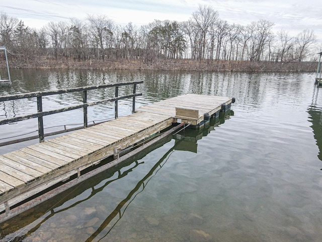 view of dock with a water view