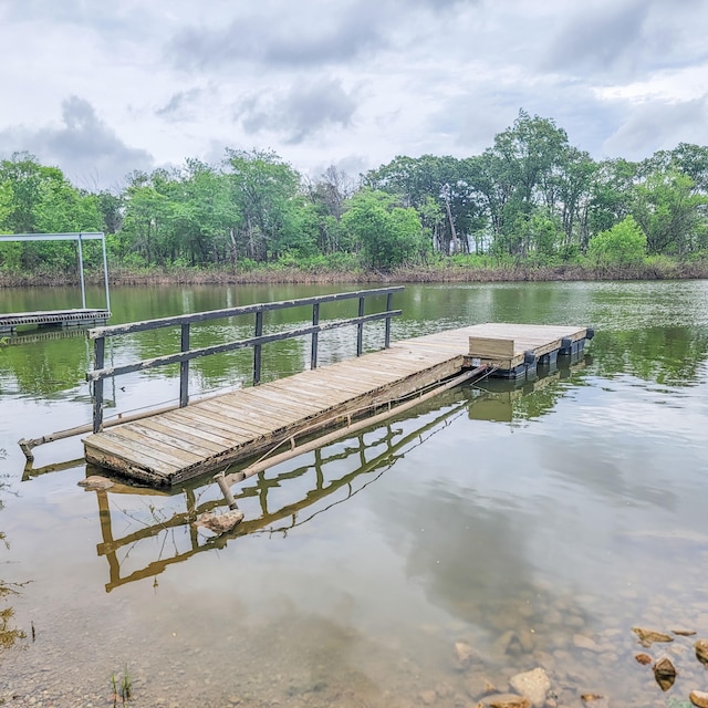 view of dock with a water view