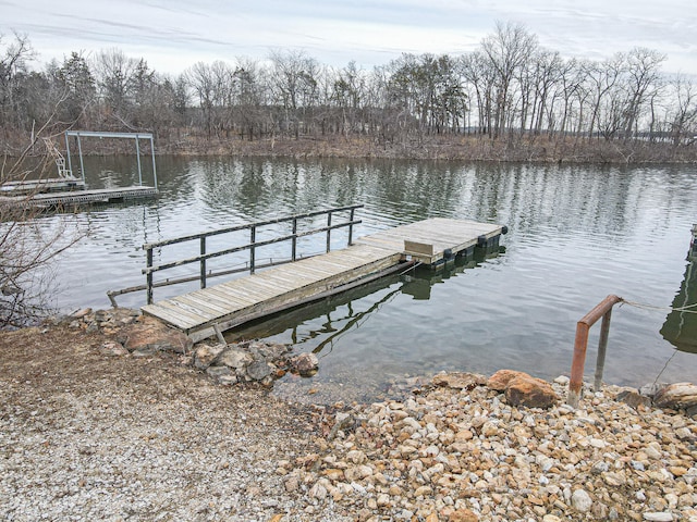 dock area featuring a water view