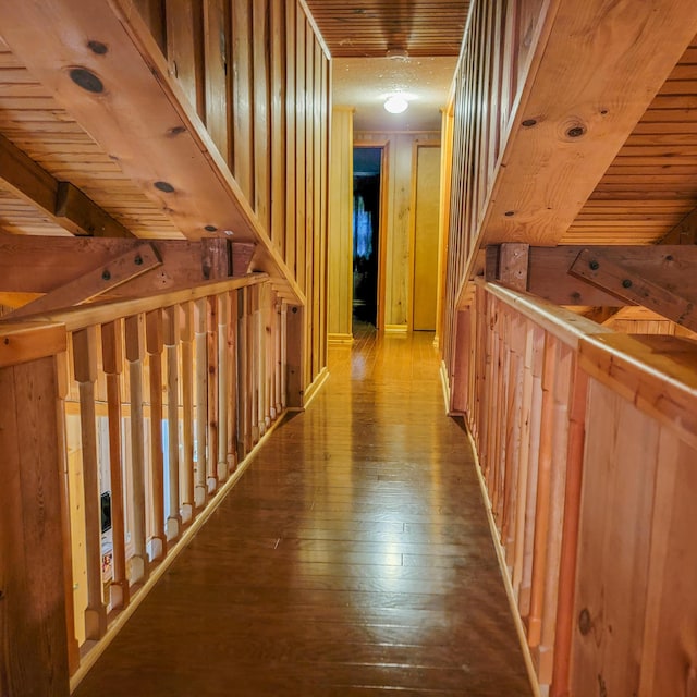 corridor with wood-type flooring