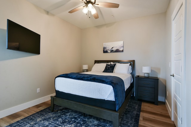 bedroom featuring ceiling fan and wood-type flooring