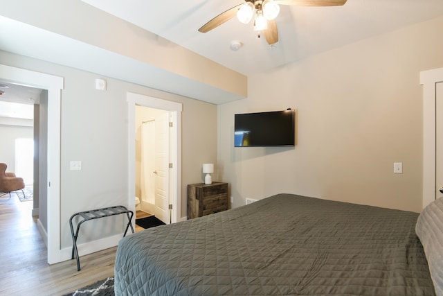 bedroom with light wood-type flooring and ceiling fan