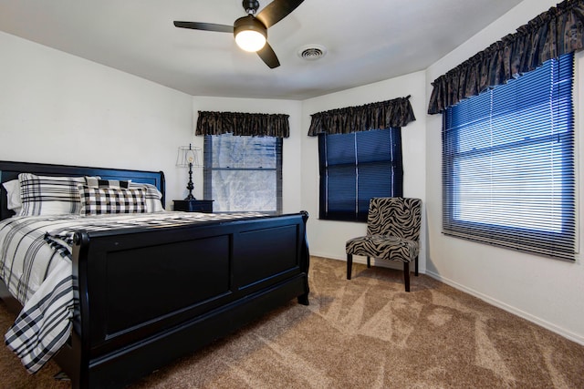 bedroom featuring ceiling fan and carpet floors