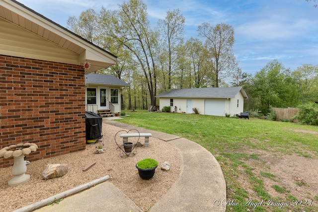 view of yard with a garage