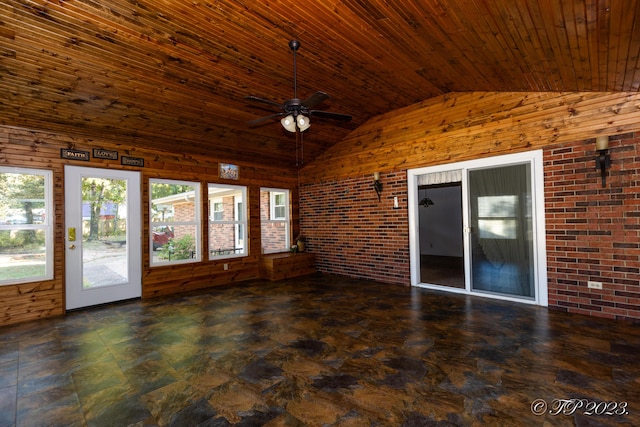 4565 State Route Cc, West Plains, MO 65775 - unfurnished sunroom featuring brick wall, vaulted ceiling, a healthy amount of sunlight, and wooden ceiling
