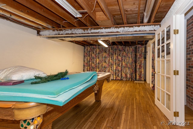 4565 State Route Cc, West Plains, MO 65775 - playroom with wood-type flooring and brick wall