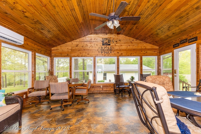 dining room with ceiling fan, a wall unit AC, a wealth of natural light, and wood walls