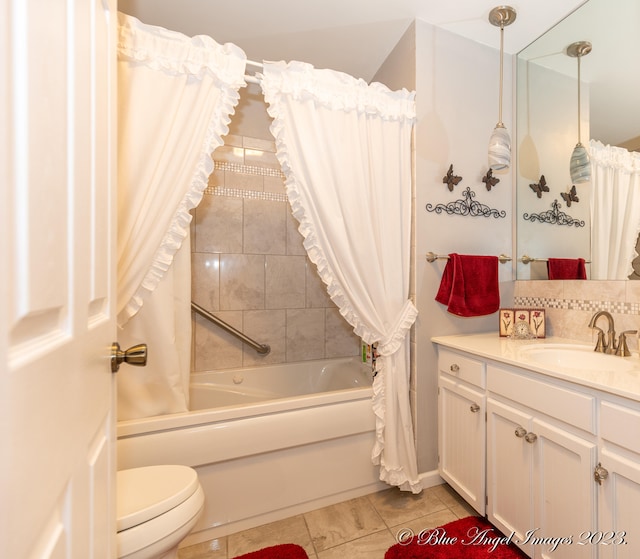 full bathroom featuring shower / bath combination with curtain, vanity, tile patterned flooring, and toilet