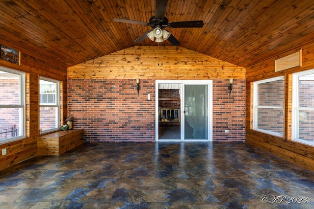 4565 State Route Cc, West Plains, MO 65775 - unfurnished sunroom featuring wooden walls, lofted ceiling, wood ceiling, and brick wall