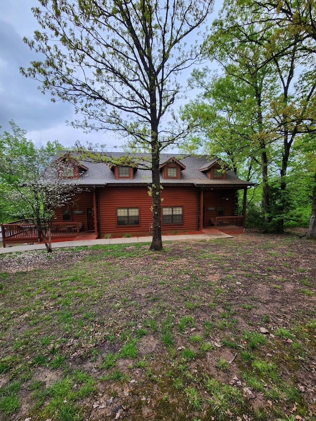 exterior space with a patio area and a deck