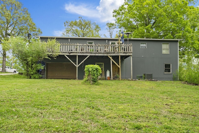 back of house featuring a yard, cooling unit, and a deck