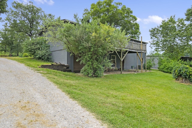 exterior space with a yard and a deck