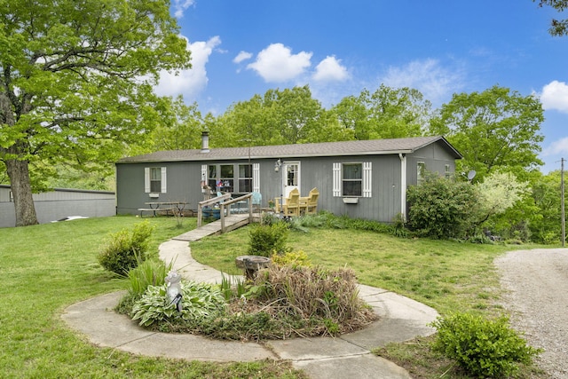 view of front of home with a front lawn