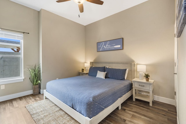 bedroom featuring ceiling fan and hardwood / wood-style flooring