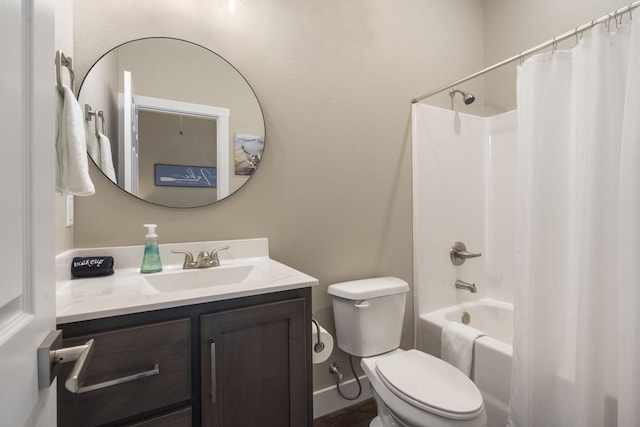 full bathroom featuring shower / tub combo, vanity, and toilet