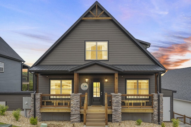 view of front of home featuring covered porch