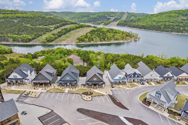 bird's eye view with a water view