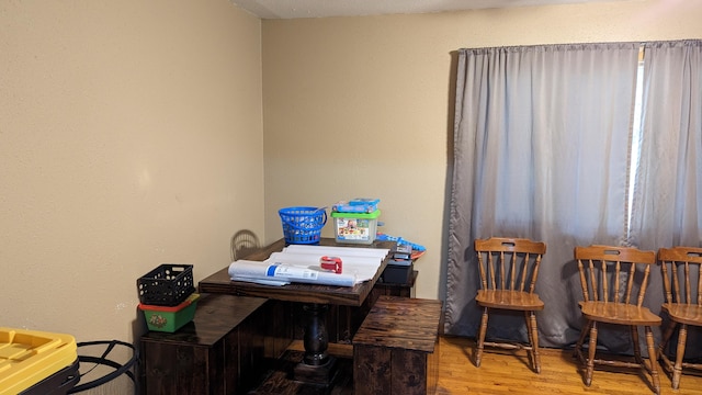 office with wood-type flooring