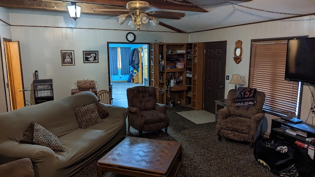 living room featuring ceiling fan, wood walls, and carpet flooring