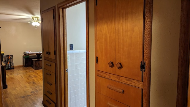 hallway featuring hardwood / wood-style floors