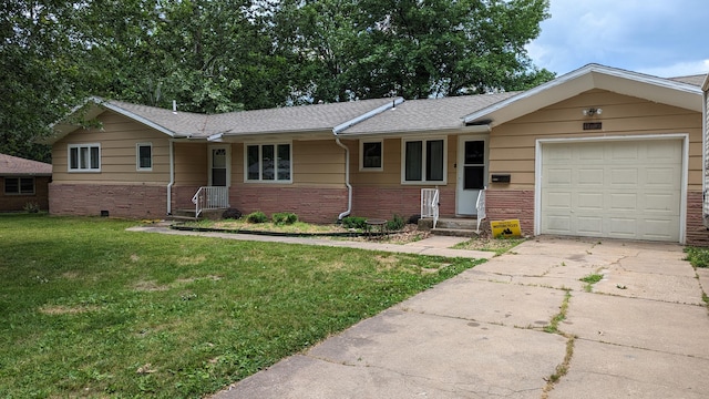 single story home with a garage and a front lawn