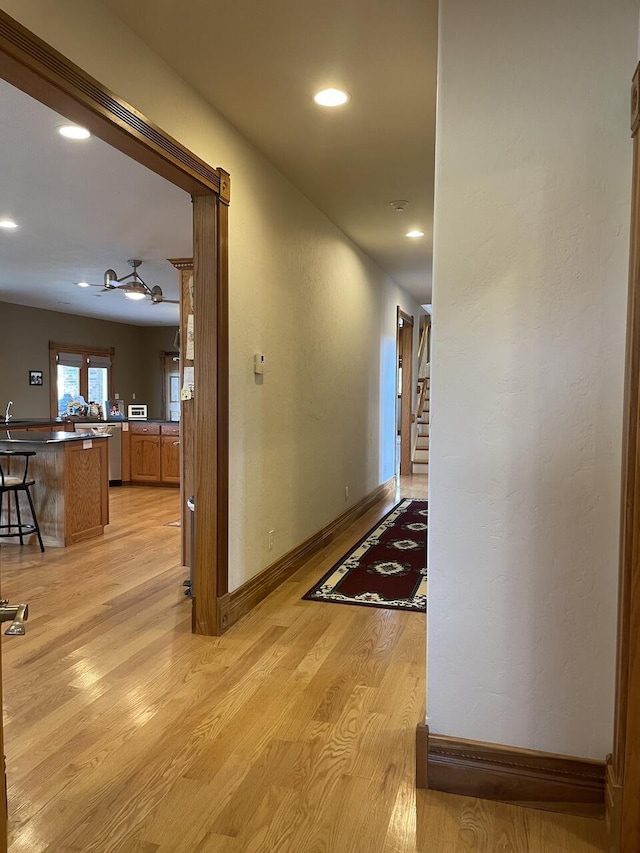1179 County Road 1050, Willow Springs, MO 65793 - hallway with light wood-style flooring, baseboards, and recessed lighting