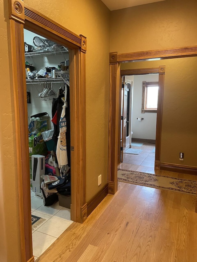 1179 County Road 1050, Willow Springs, MO 65793 - hall with wood finished floors, baseboards, and a textured wall