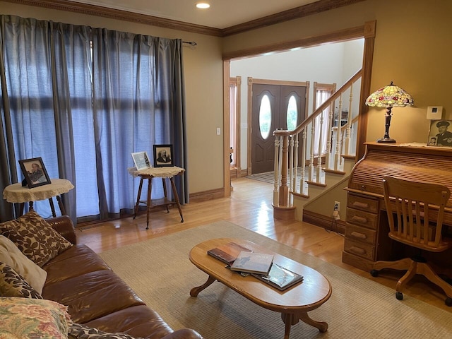 1179 County Road 1050, Willow Springs, MO 65793 - living area featuring wood finished floors, stairs, baseboards, and ornamental molding