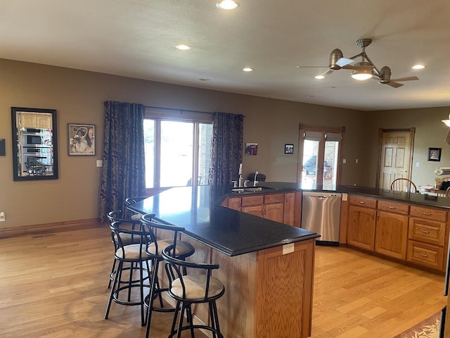 1179 County Road 1050, Willow Springs, MO 65793 - kitchen featuring light wood finished floors, dishwasher, a sink, and recessed lighting