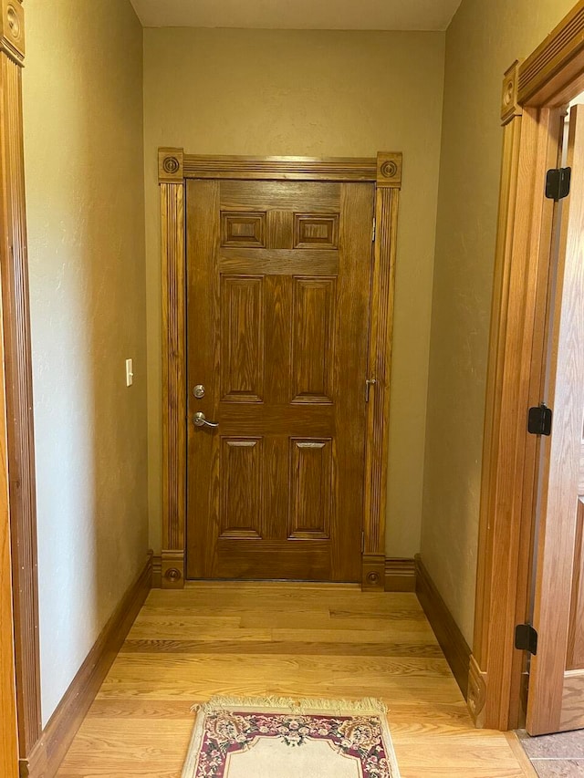 hallway featuring light wood-type flooring