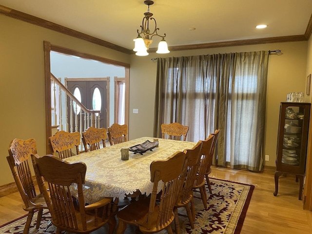 1179 County Road 1050, Willow Springs, MO 65793 - dining room featuring an inviting chandelier, ornamental molding, light wood-style floors, and baseboards