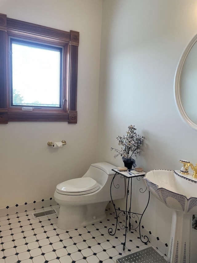 1179 County Road 1050, Willow Springs, MO 65793 - half bathroom featuring toilet, tile patterned floors, and visible vents