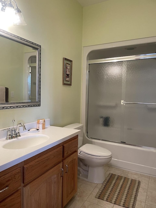 1179 County Road 1050, Willow Springs, MO 65793 - full bath featuring tile patterned flooring, toilet, vanity, and combined bath / shower with glass door
