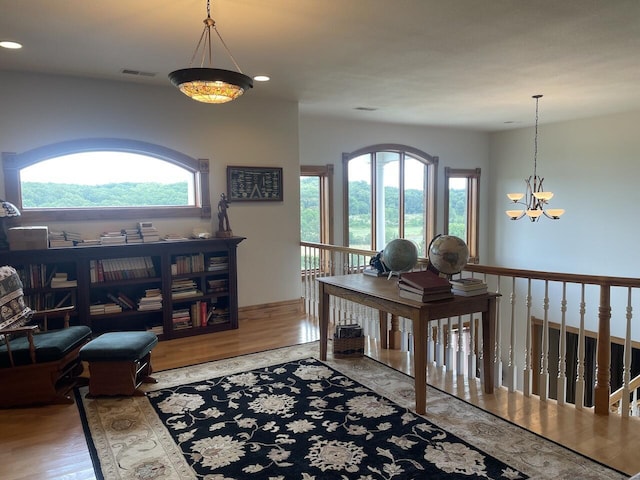 1179 County Road 1050, Willow Springs, MO 65793 - interior space with recessed lighting, wood finished floors, visible vents, and a notable chandelier