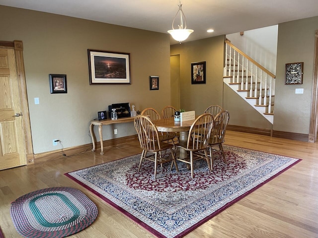 1179 County Road 1050, Willow Springs, MO 65793 - dining space with stairway, baseboards, wood finished floors, and recessed lighting