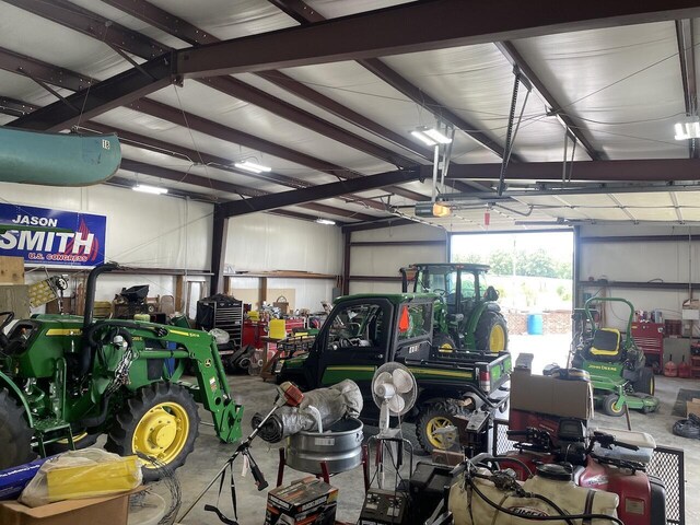 1179 County Road 1050, Willow Springs, MO 65793 - garage featuring a garage door opener