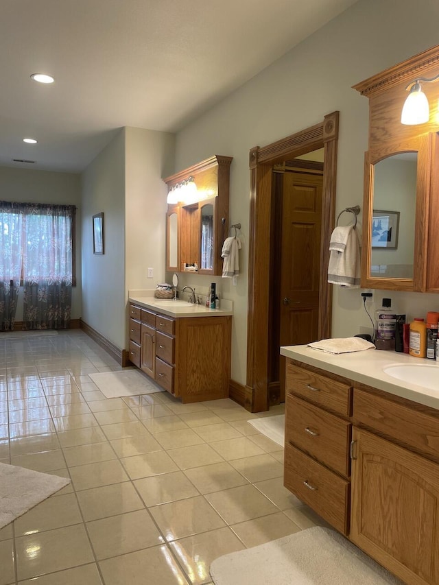 1179 County Road 1050, Willow Springs, MO 65793 - bathroom featuring recessed lighting, tile patterned floors, a sink, baseboards, and two vanities