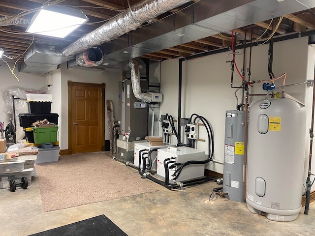 basement with water heater and heating unit