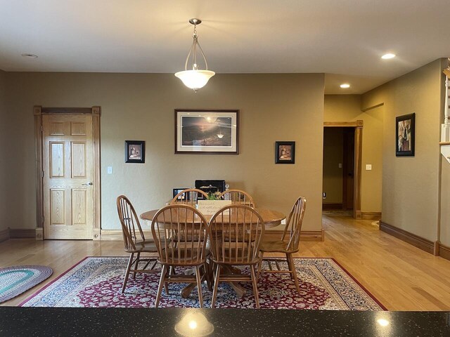 1179 County Road 1050, Willow Springs, MO 65793 - dining room featuring baseboards, wood finished floors, and recessed lighting